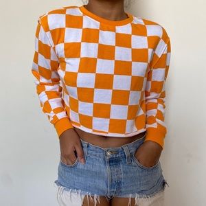 Cute orange checkered sweater!